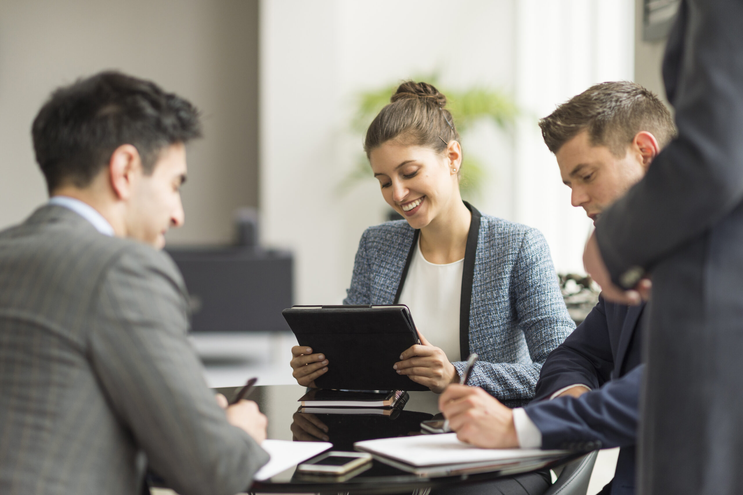 Businessmen and women having office meeting